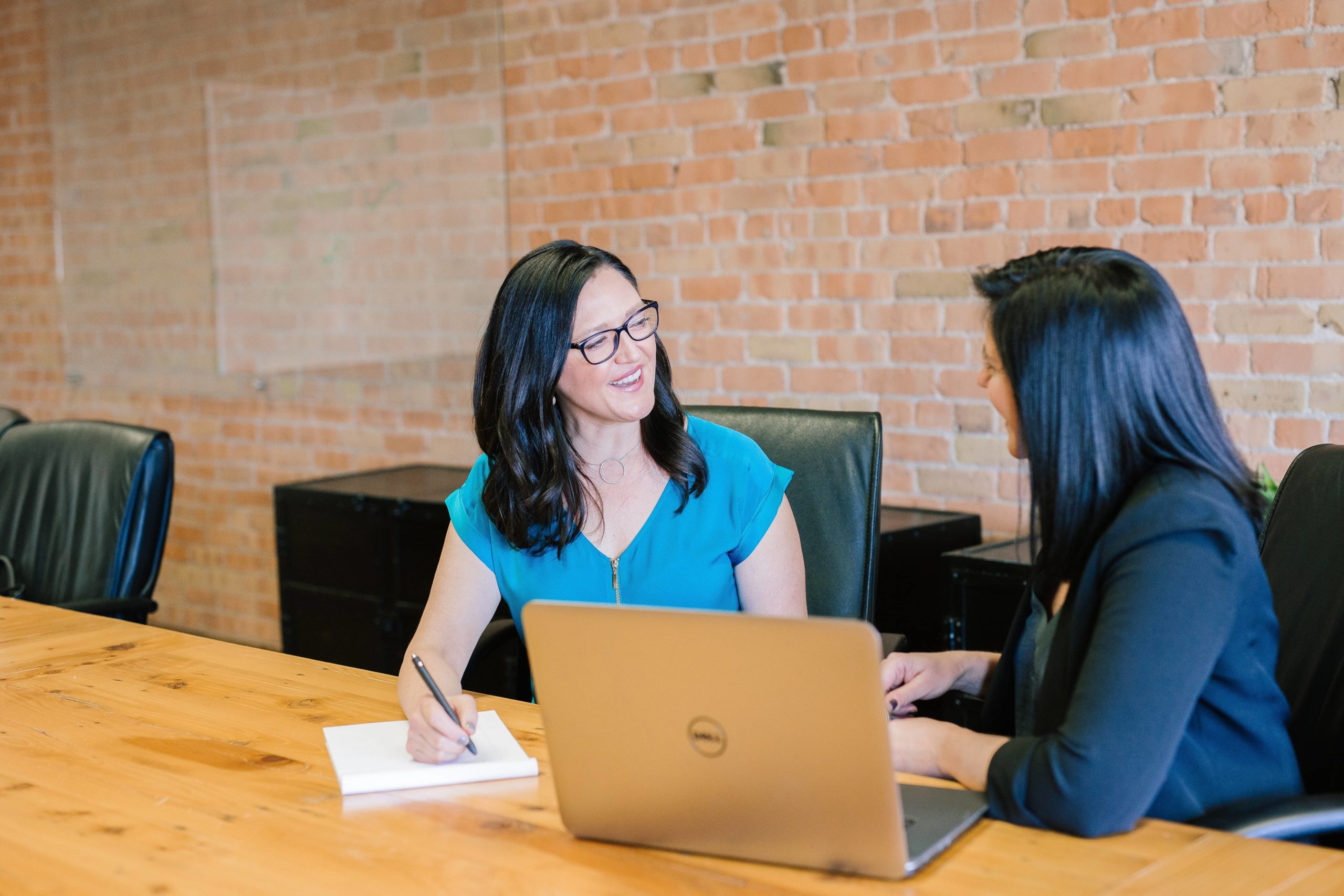 woman listening to personal injury victim for their free consultation