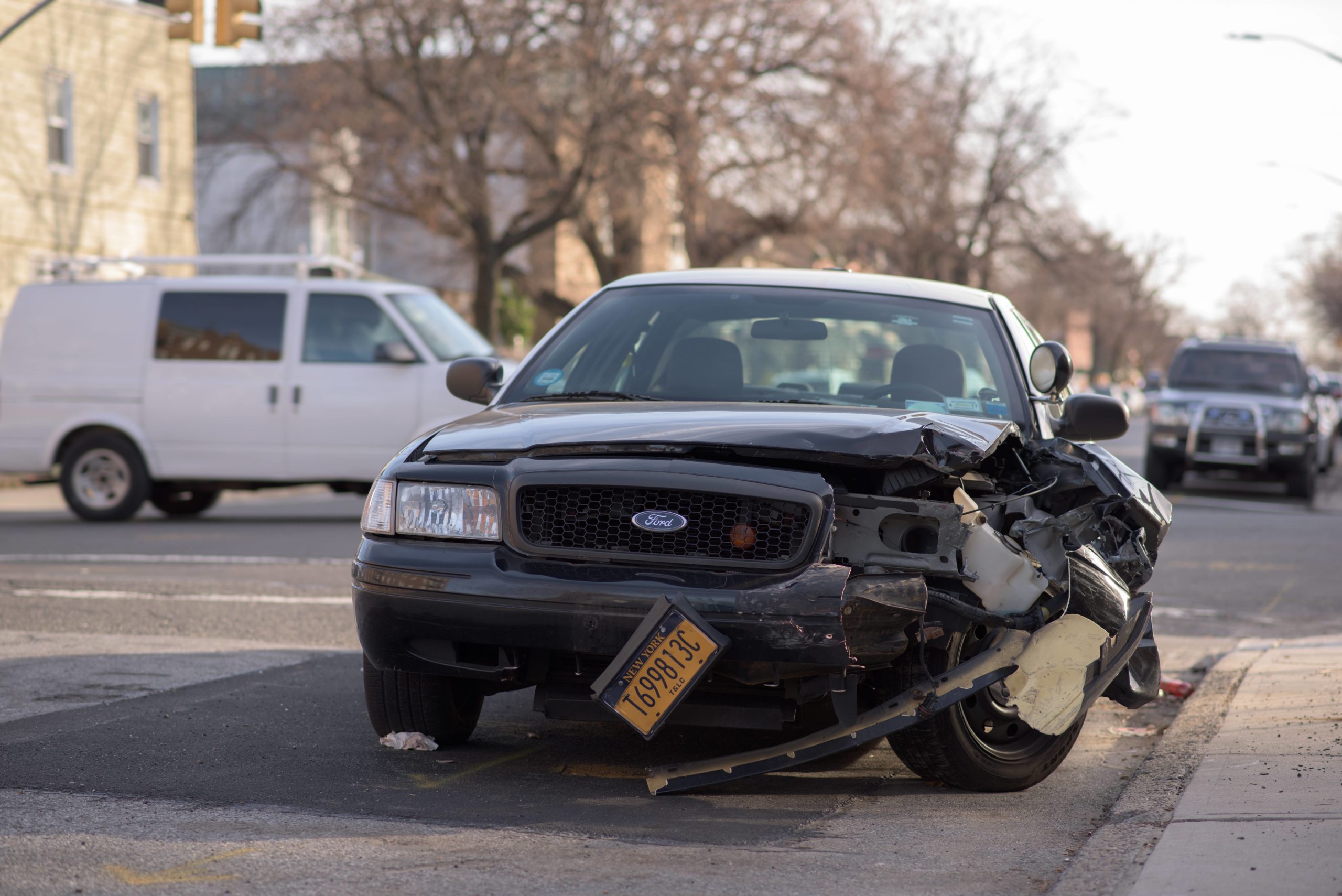 Black vehicle with a smash front after a car accident